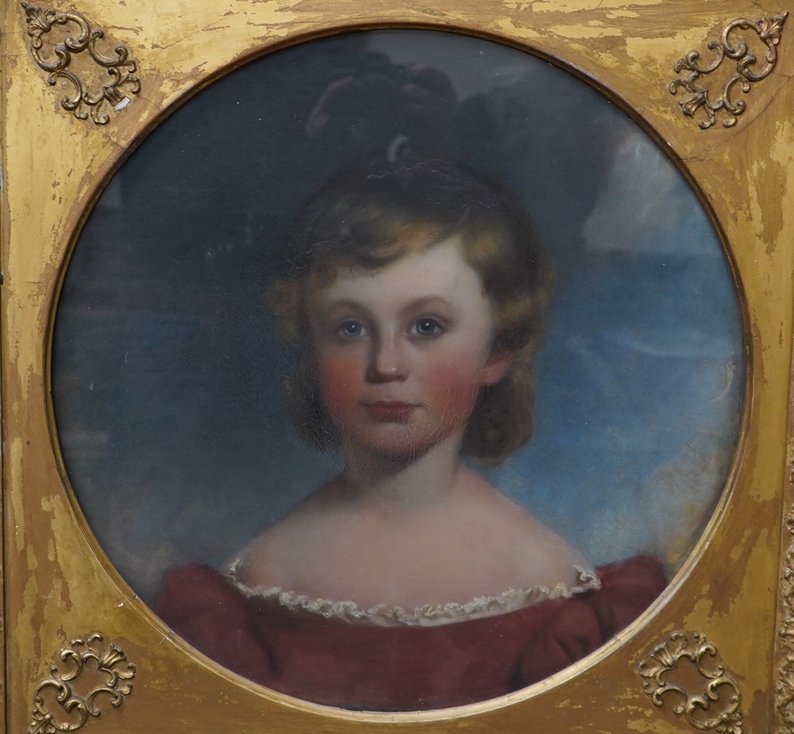 19th century English School, tondo pastel, Head and shoulders portrait of a young boy, unsigned, diameter 46cm, ornate gilt frame. Condition - poor to fair
